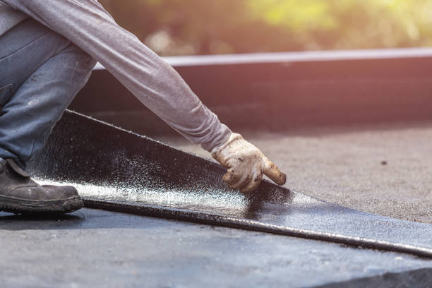 Professional Exterior Waterproofing technician working in Maryland, MD